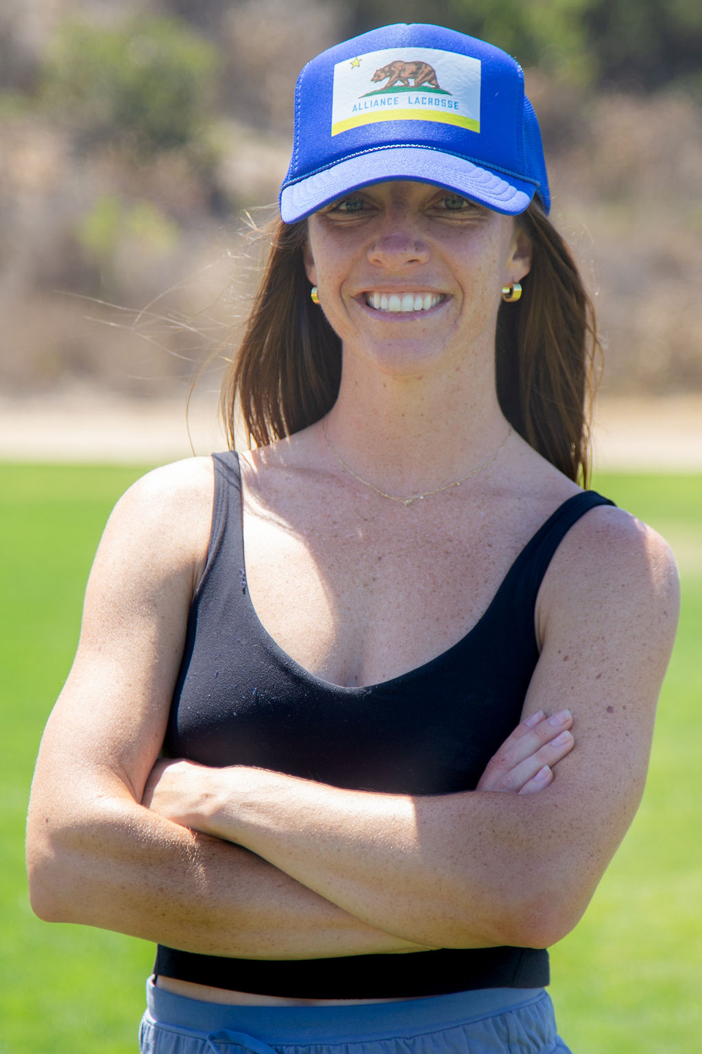 A headshot of Tara Chelios, head coach at Alliance National
