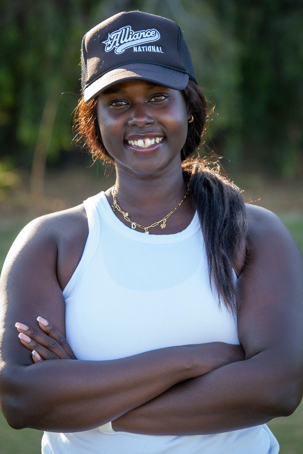 A headshot of Diana Oduho, one of the head coaches at Alliance National.